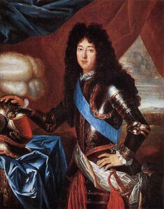 Philippe de France mengenakan baju besi fleur-de-lis dan Cordon Bleu dari Ordre du Saint-Esprit.